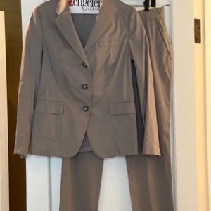 Prada grey lightweight women’s suit.